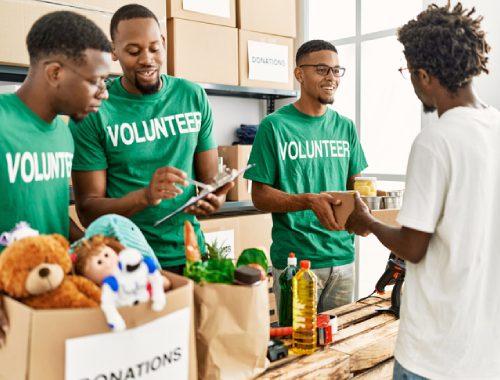 Group of people wearing green t shirt