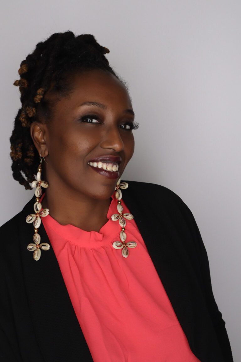 A Portrait of a Woman With Long Earrings and Black Shrug